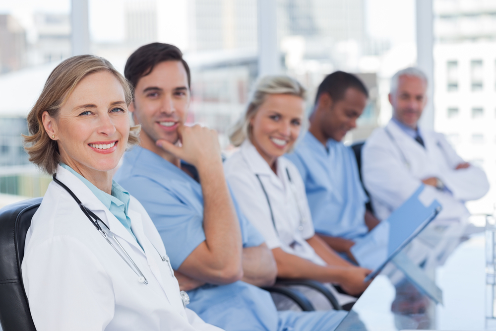 Medical team in row looking at the camera